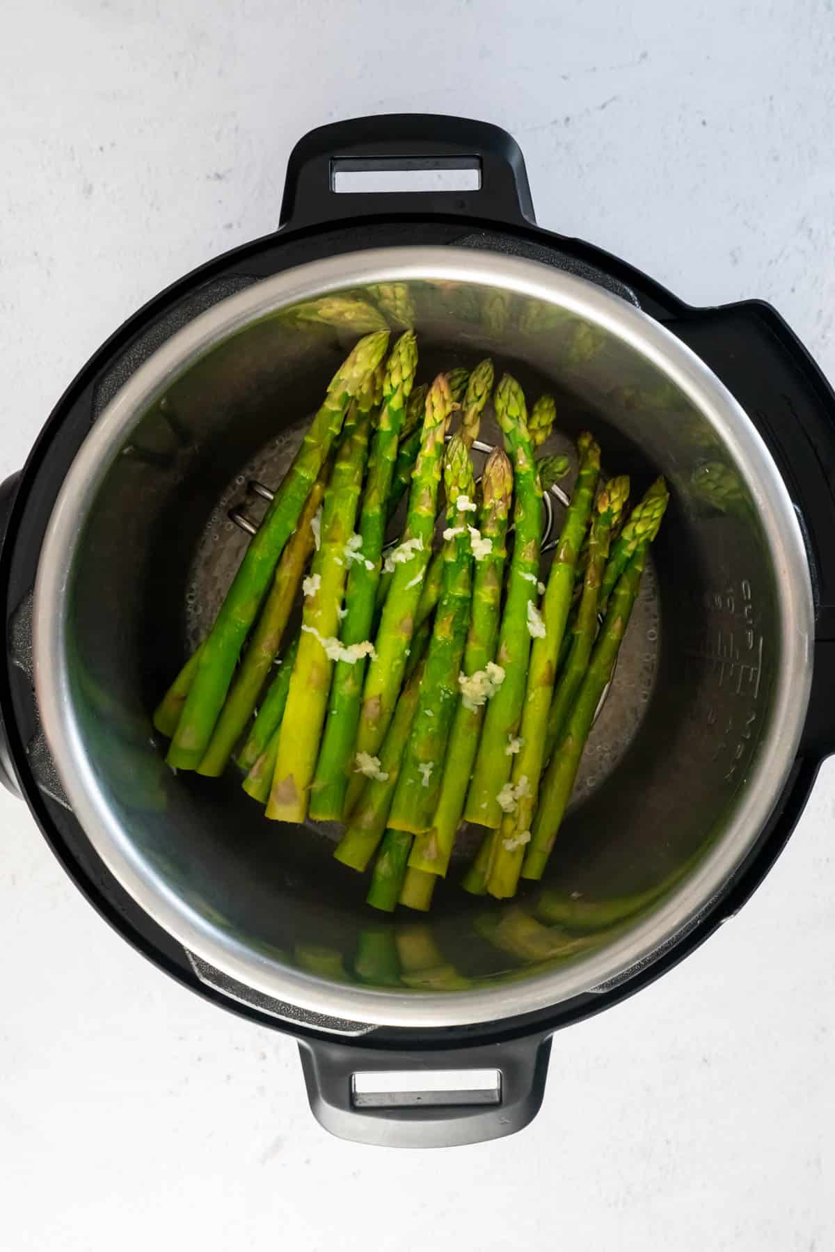 asparagus with the other ingredients in the instant pot