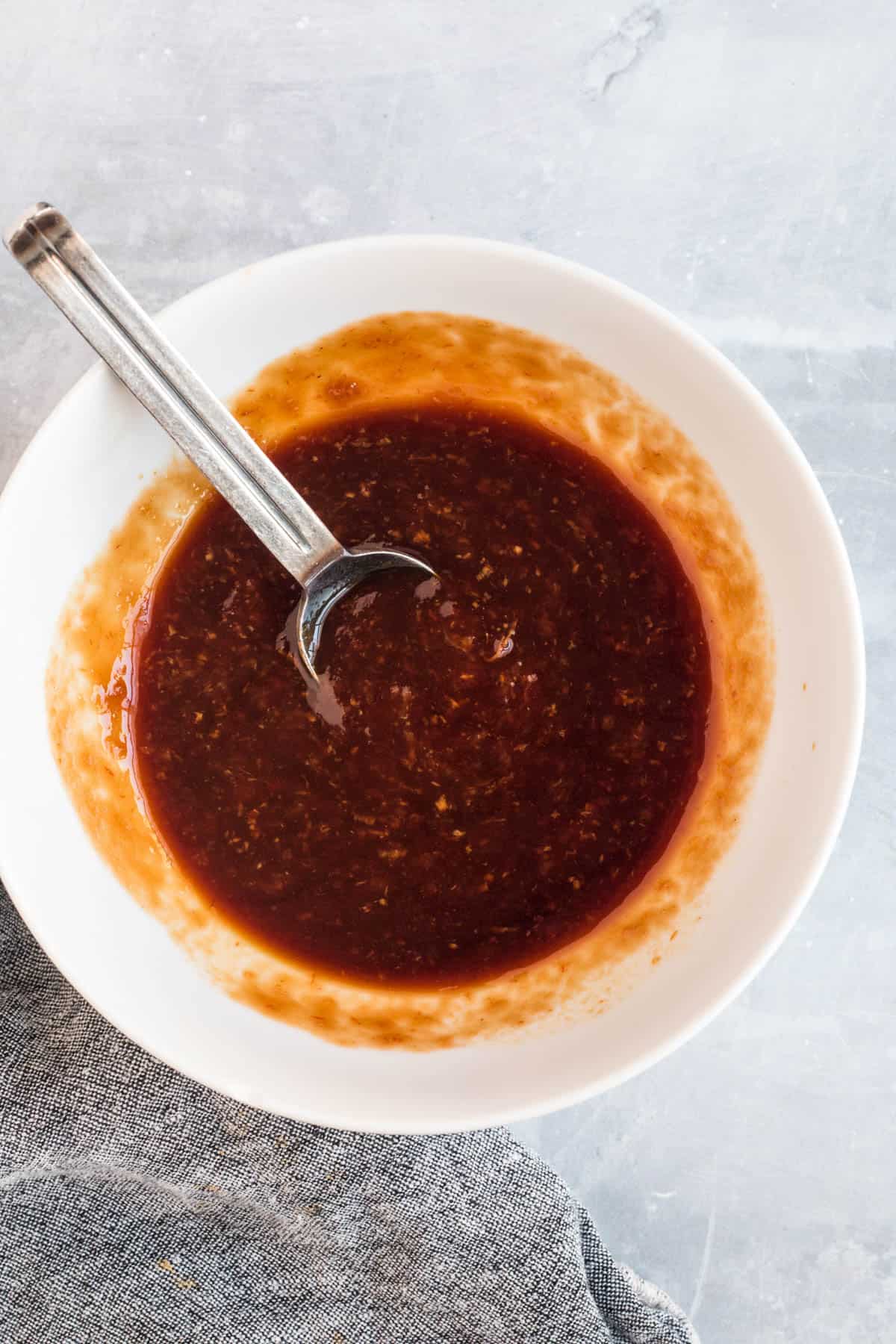 Homemade sweet and sour sauce mixed in a bowl before cooking.