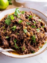 cooked shredded beef in a bowl for serving