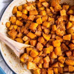 Sauteed butternut squash in a large skillet after cooking.