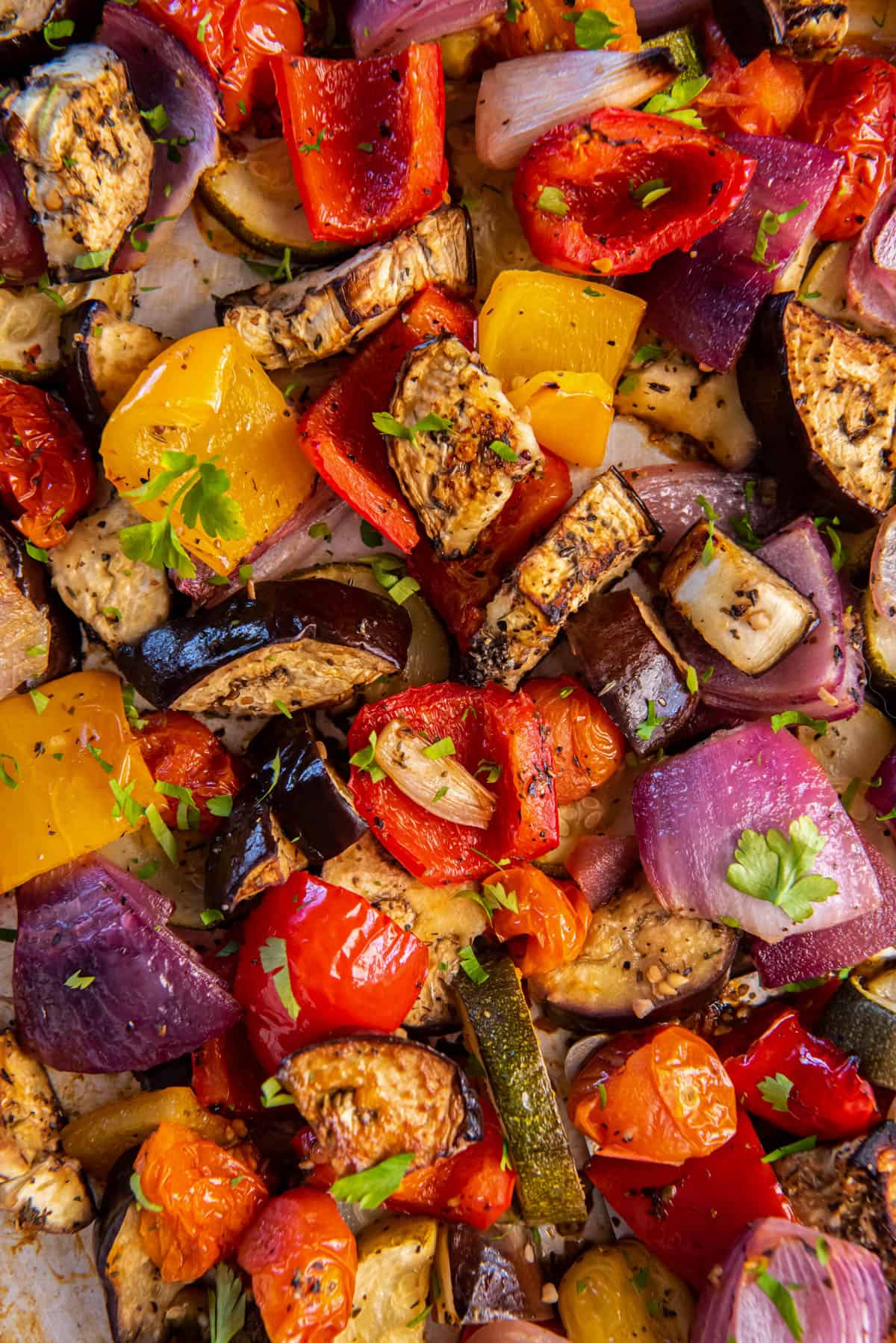 Mediterranean Roasted Vegetables on a sheet pan after cooking.