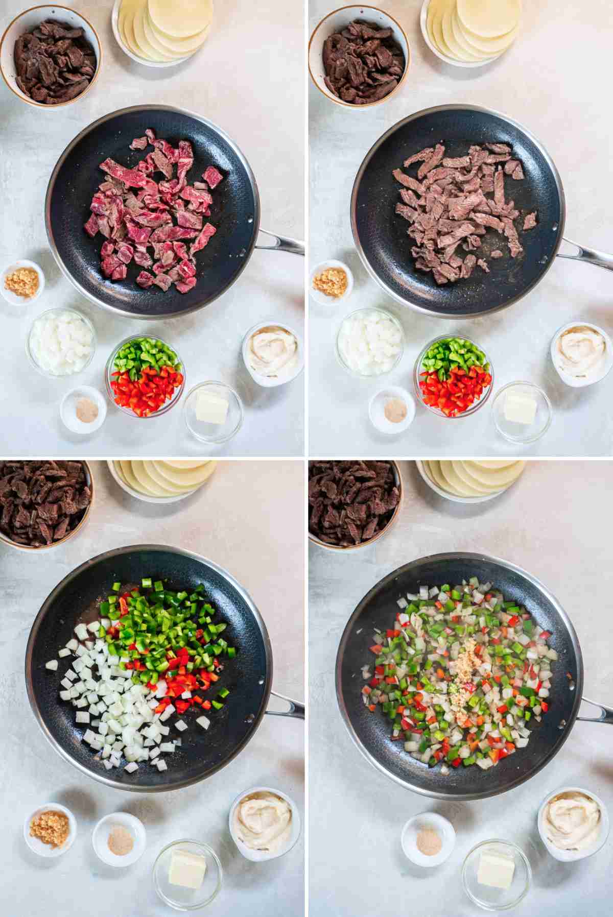 Sliced steak and chopped peppers and onions cooking in a skillet.