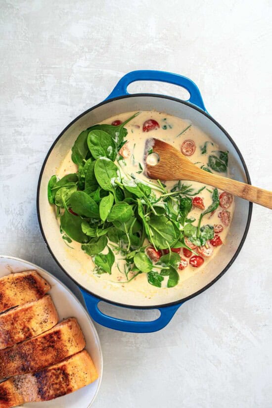 Creamy Tuscan Salmon Recipe with Spinach and Sun-Dried Tomatoes ...