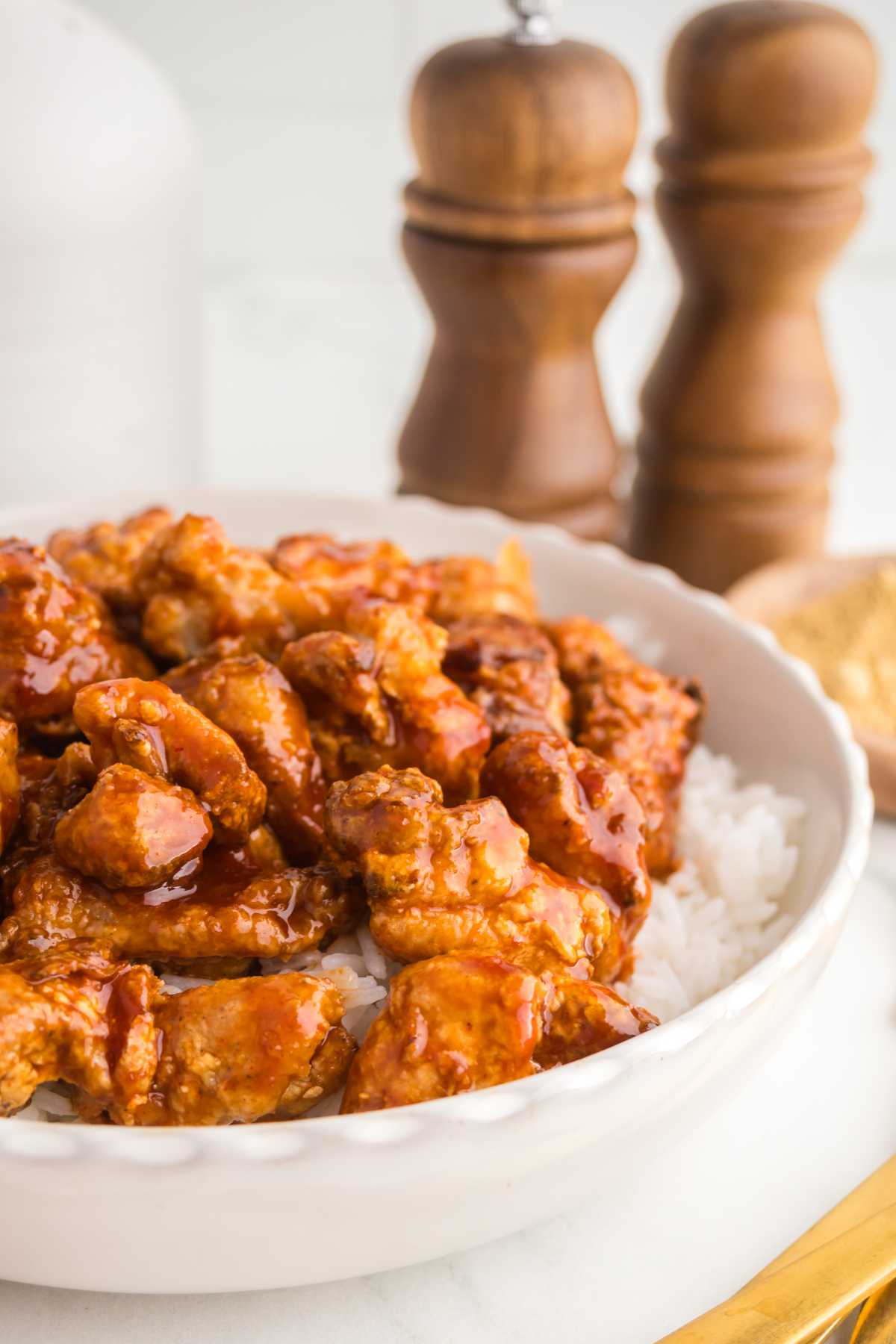 Crispy air fryer Gochujang Chicken served over white rice with glossy Korean-style sauce.