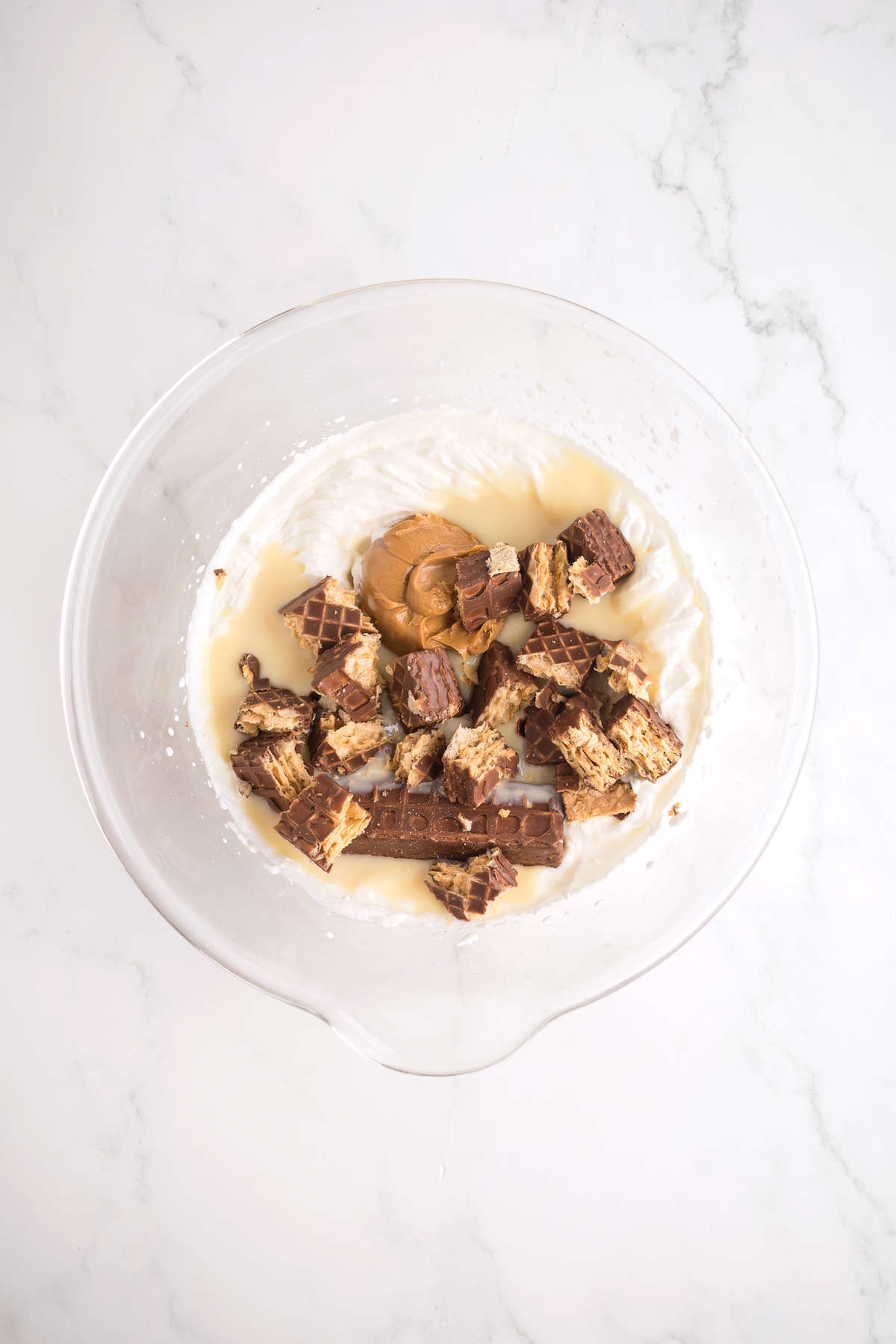 Chopped Nutty Buddy bars, peanut butter and sweetened condensed milk added to whipped cream.